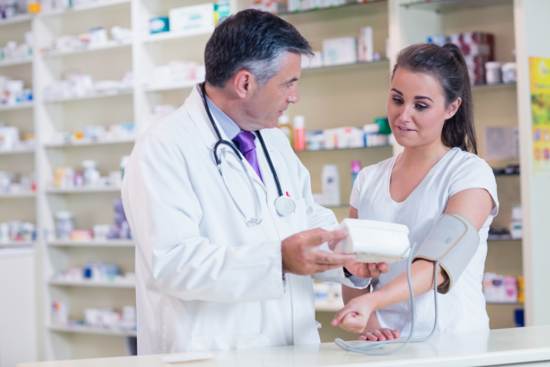 Pharmacist helping a patient